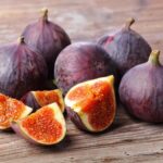 fresh figs on a wooden table