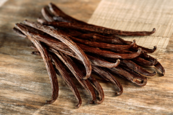 vanilla beans on wood counter