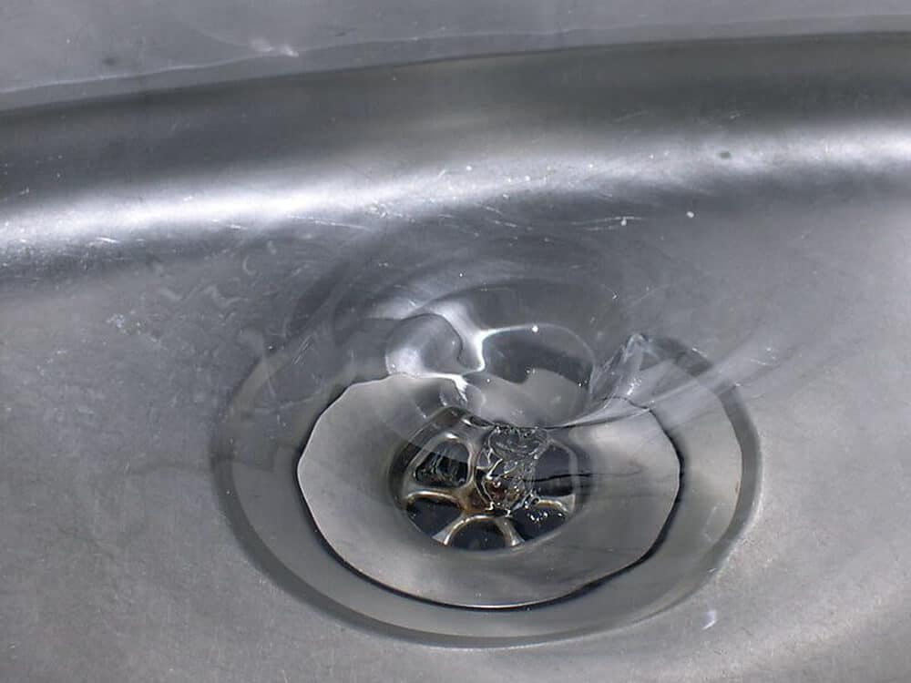 How to unclog a drain without calling a plumber