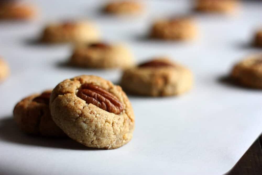 gluten free pecan sandies on a white countertop