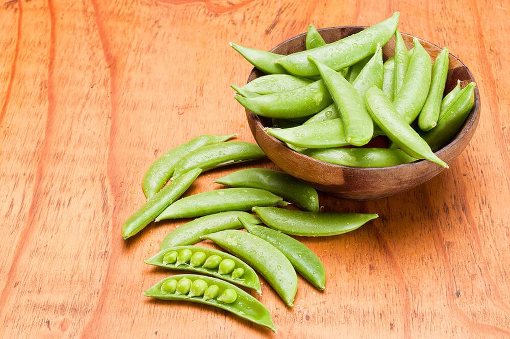 snap peas in a bowl on the table